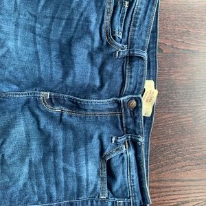 Blue high rise skinny jeans.